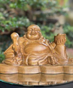 Tượng Di Lặc như ý bách xanh