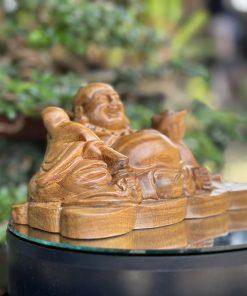 Tượng Di Lặc như ý bách xanh