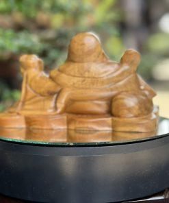 Tượng Di Lặc như ý bách xanh