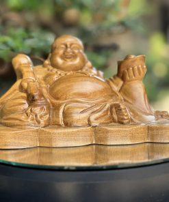 Tượng Di Lặc như ý bách xanh